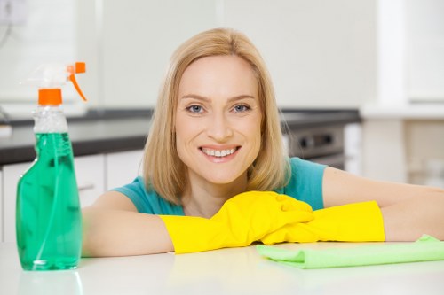 Professional carpet cleaner maintaining a safe and tidy workspace